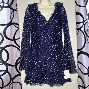 ASOS DESIGN 90s ruffle front mini dress in navy spot prin
